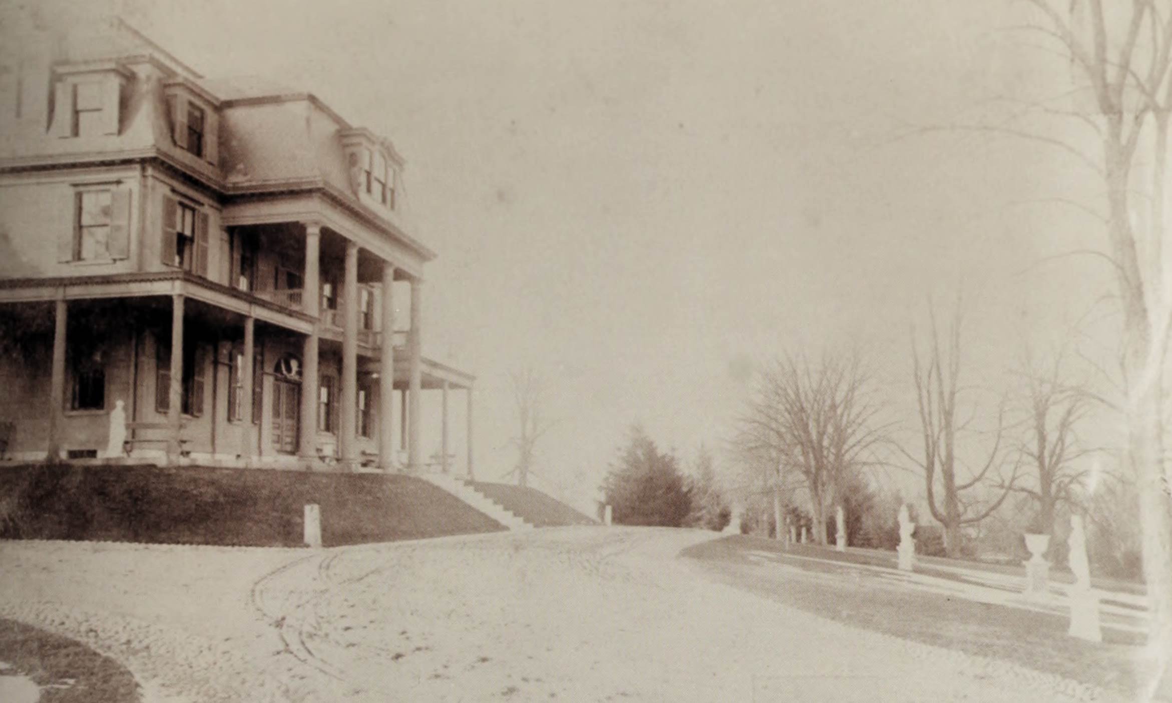 A sepia-tone photo of the mansion on Bussey Hill.