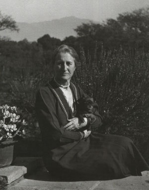 Beatrix Jones Farrand seated outdoors.