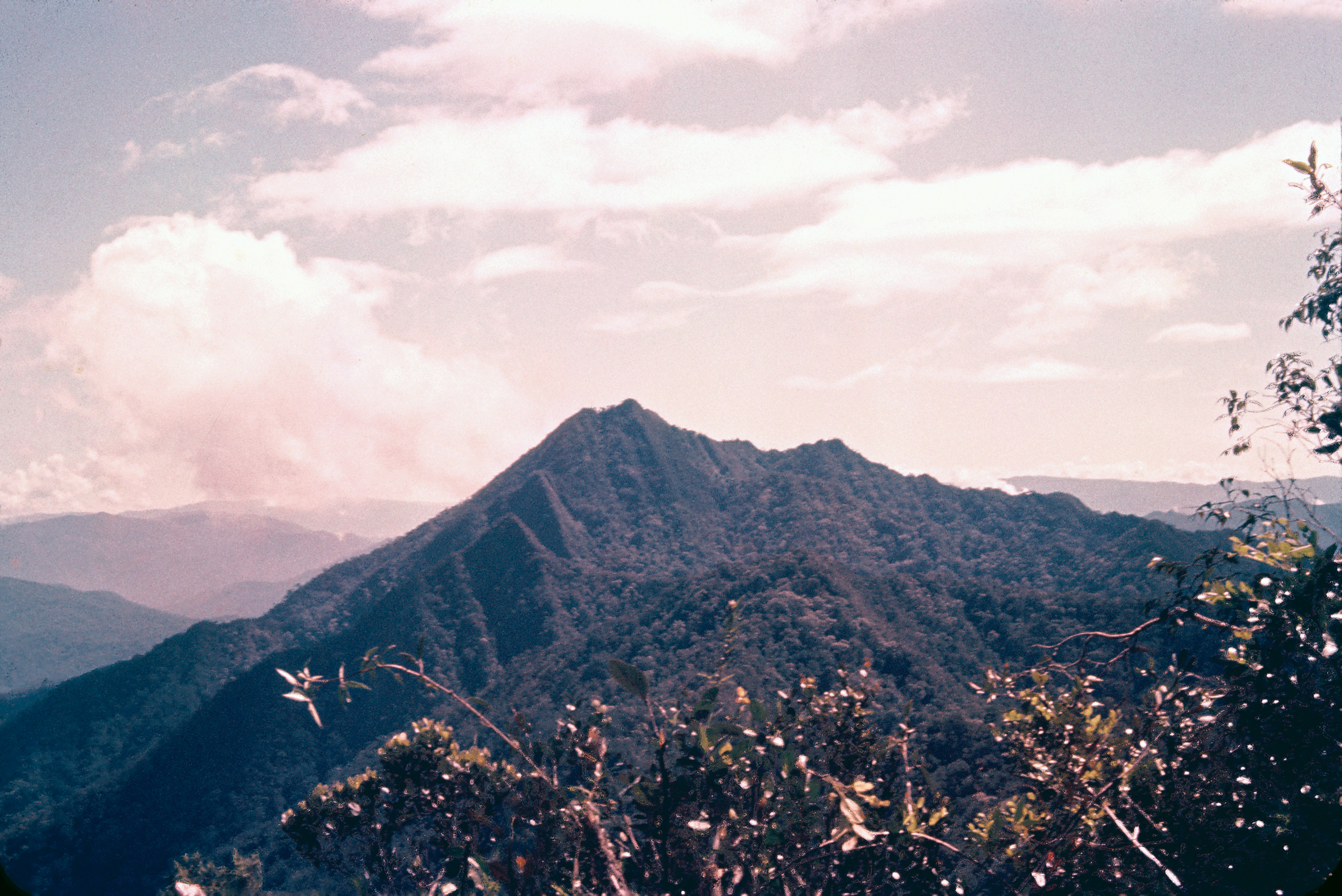 Recolored photograph of distant mountain