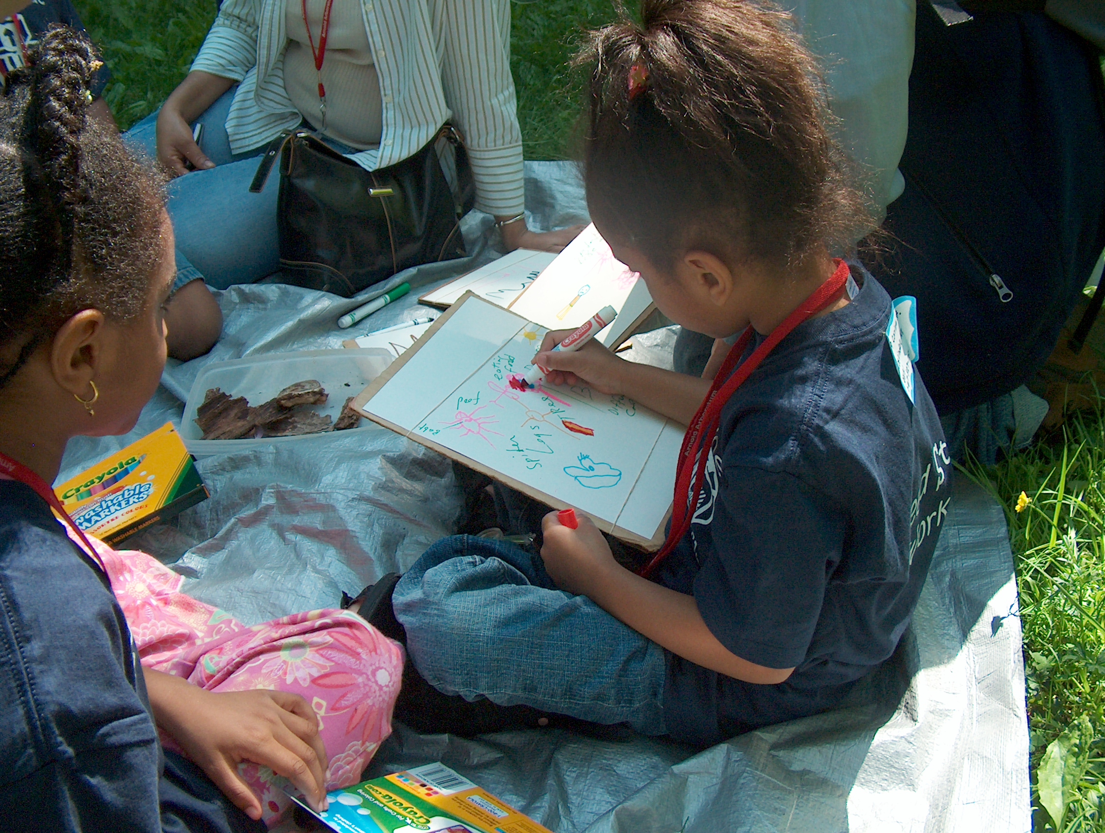 Children draw plants and animals in the Arboretum.