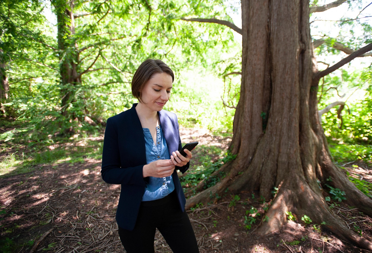 Person holding a mobile phone