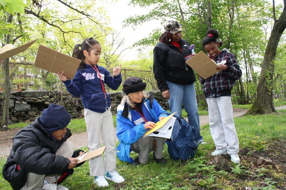 Volunteers make science real for students. Photographs by Jon Hetman, Nancy Sableski, Kevin Schofield, and Julie Warsowe.