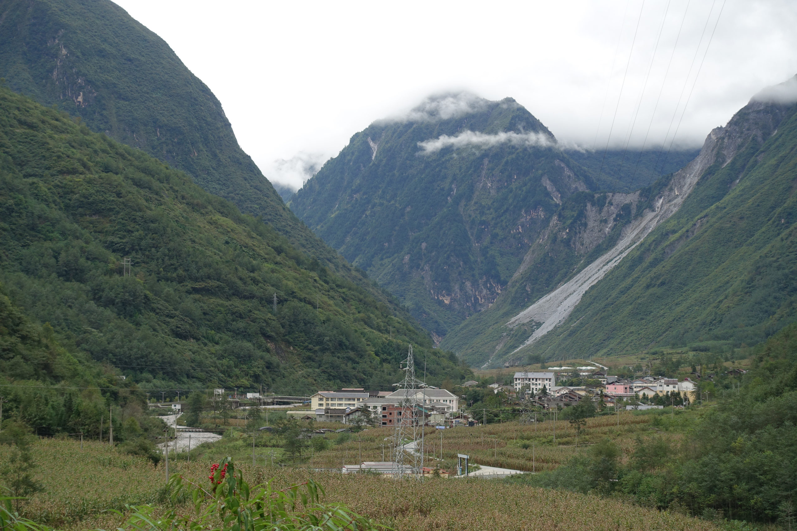 View of rockslide into the Fujiang River valley near village of Xiaohexiang, Pingwu County, Sichuan, China. E. H. Wilson captured this same view on August 19, 1910, shown below.