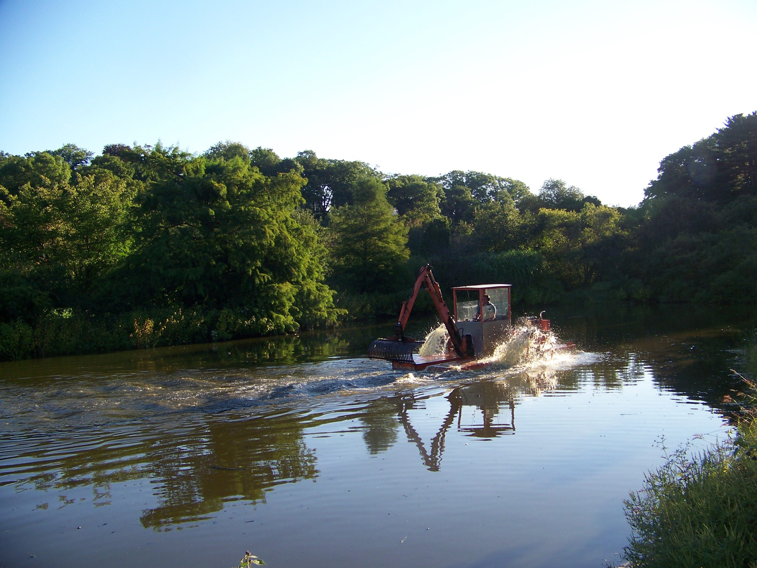 Hydro-raking Dawson Pond.