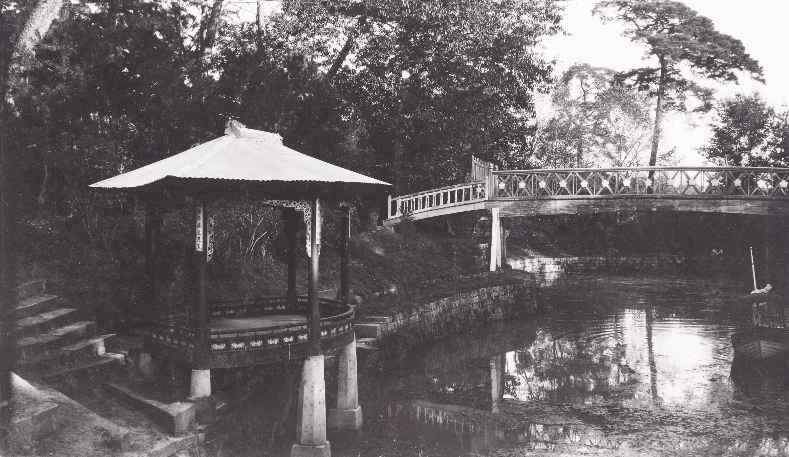 A pond and small structure on the grounds of East Palace, Seoul, Korea. Photograph by John Jack, September 24, 1905.