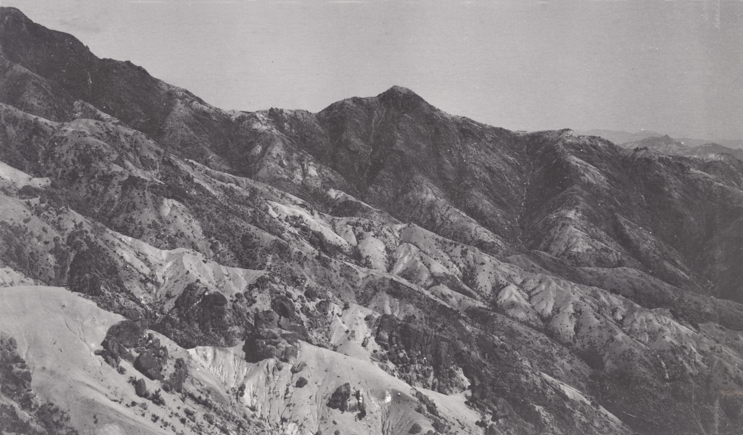 Granite slopes of solid and disintegrated rock, destitute of forest cover, chiefly due to having been cut over for logging. Bukhansan Mountain (Pouck-Han), Seoul, Korea (now South Korea). Photograph by John Jack, September 25, 1905.