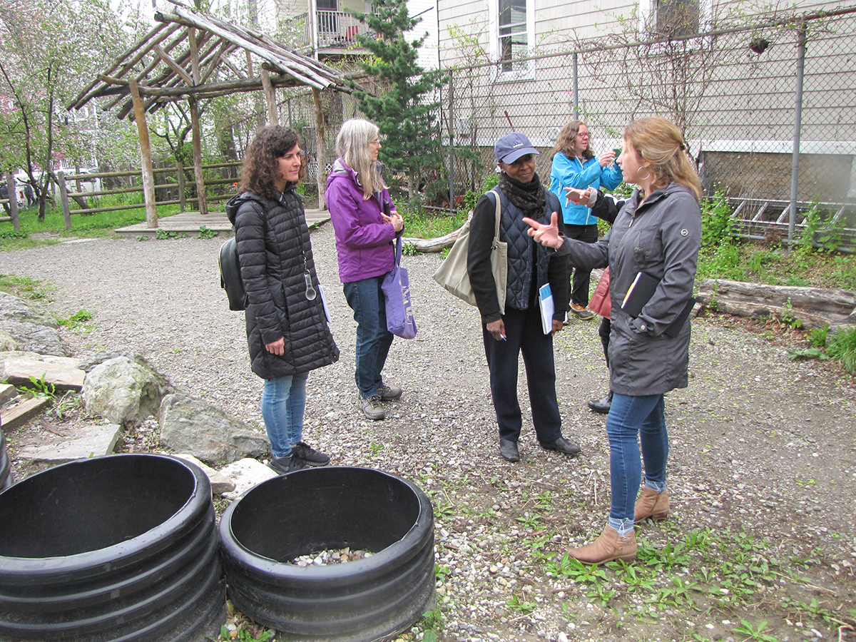 Participants discuss ways to utilize rubber bins to teach many different scientific concepts.