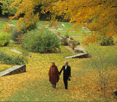 Couple walking in leventritt garden in autumn