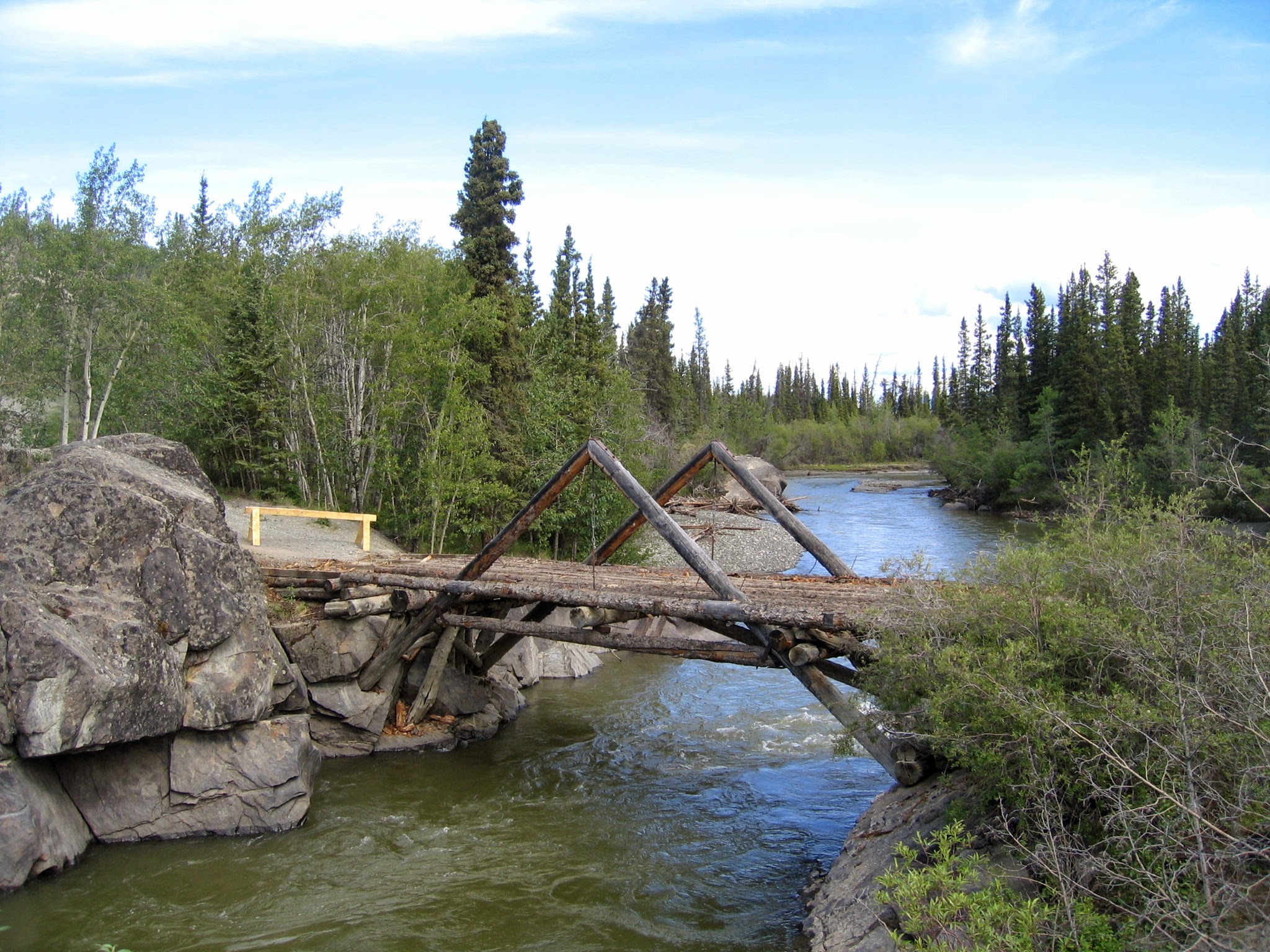 A replica log bridge over the Aishihik River near the Alaska-Canada Military Highway represents the types of river crossings on the road in 1943 and 1944.