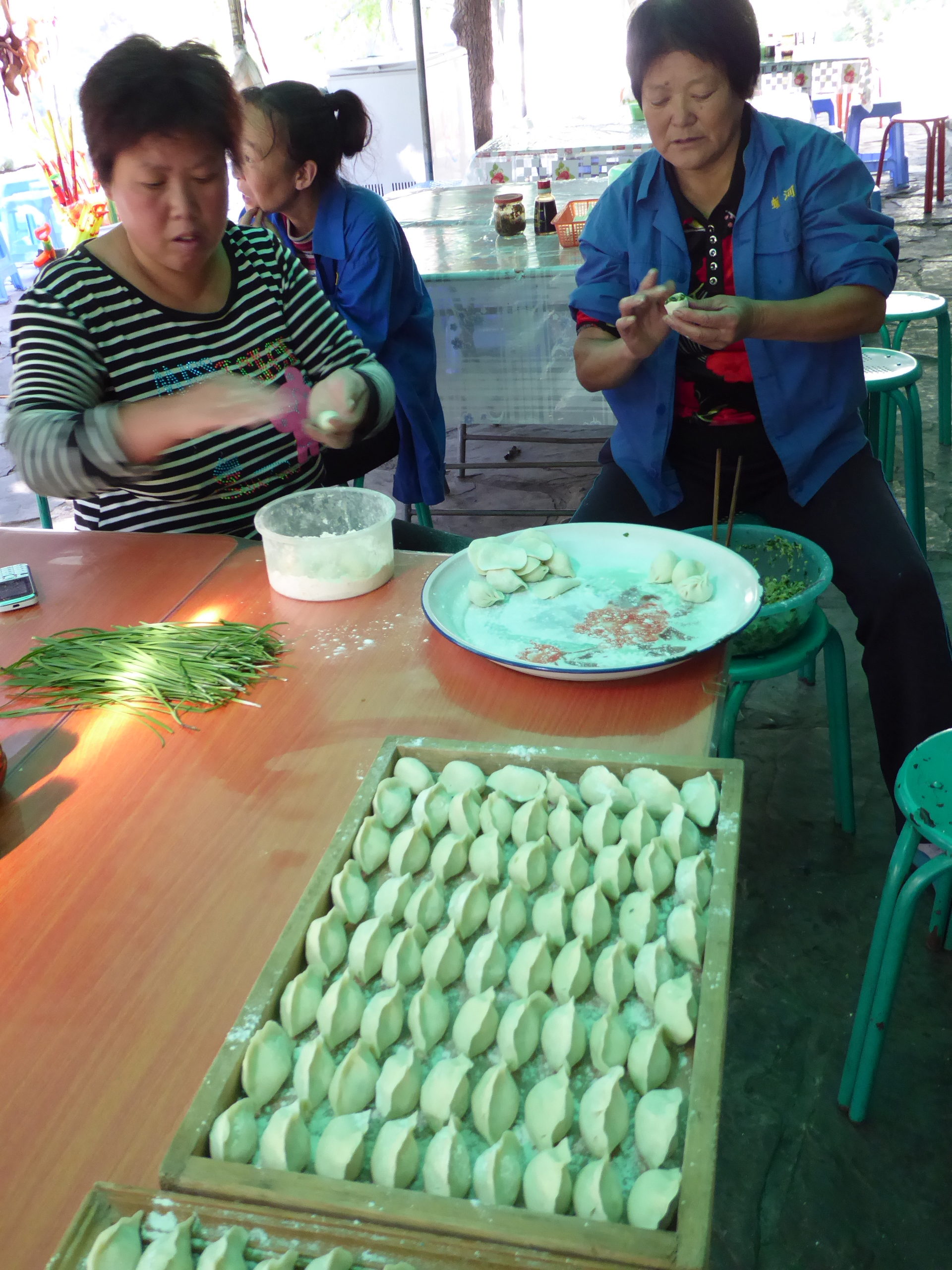 Women making dumplings for sale at the Manghe Nature Preserve, Yangcheng, Shanxi.