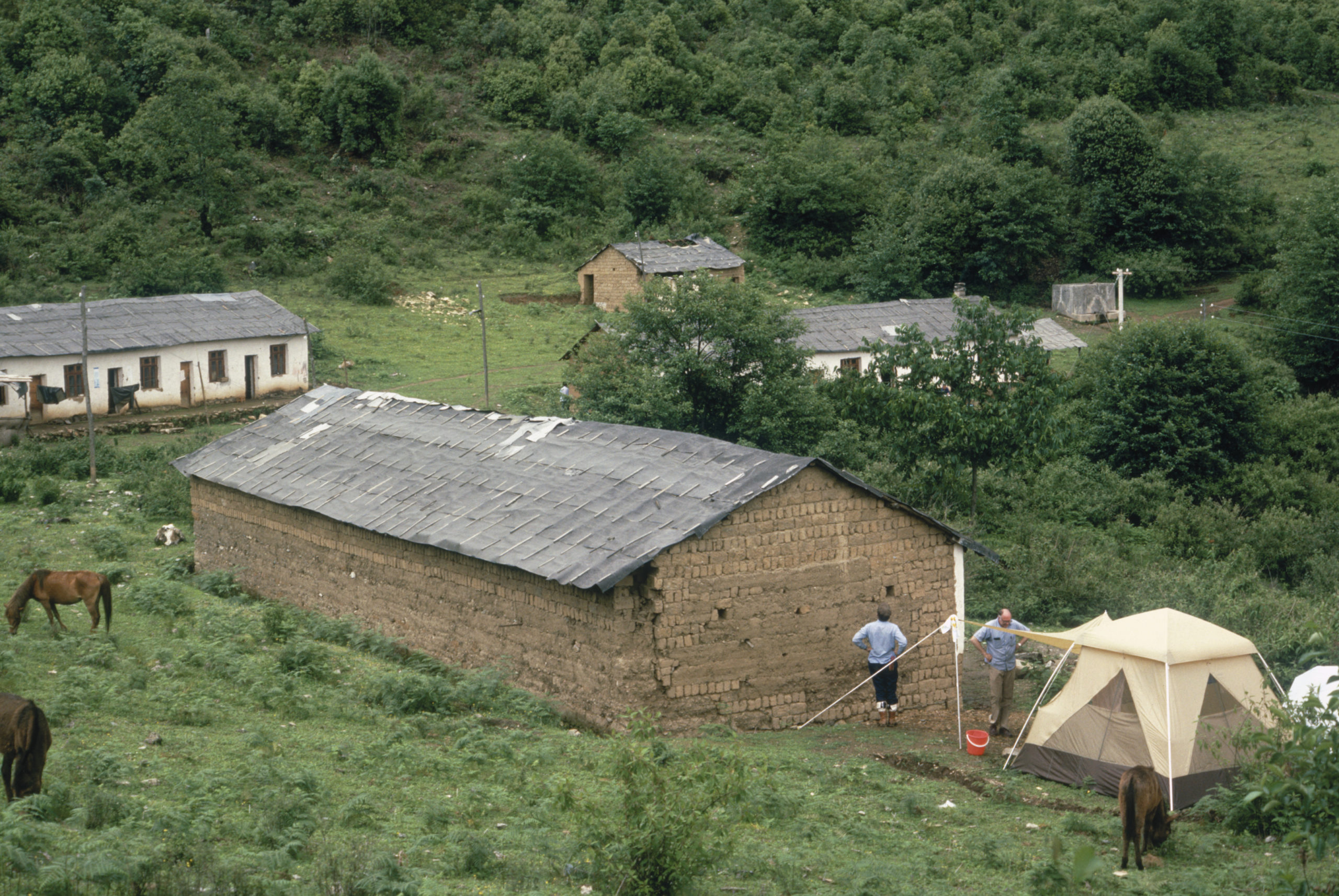 Tent and buildings at the 1984 SABE expedition campsite on Chong Shan.