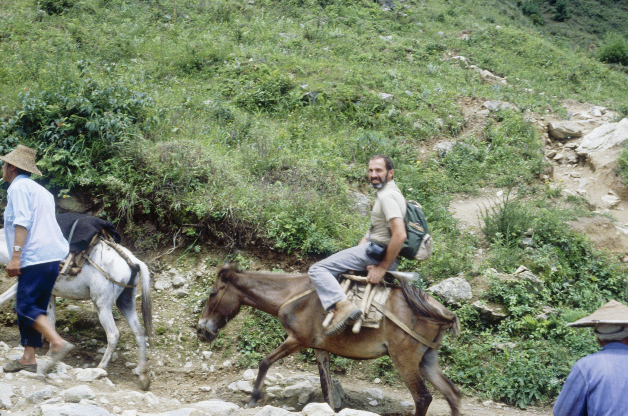 David Boufford riding with the pack train on the way to Huadianba, Yunnan.
