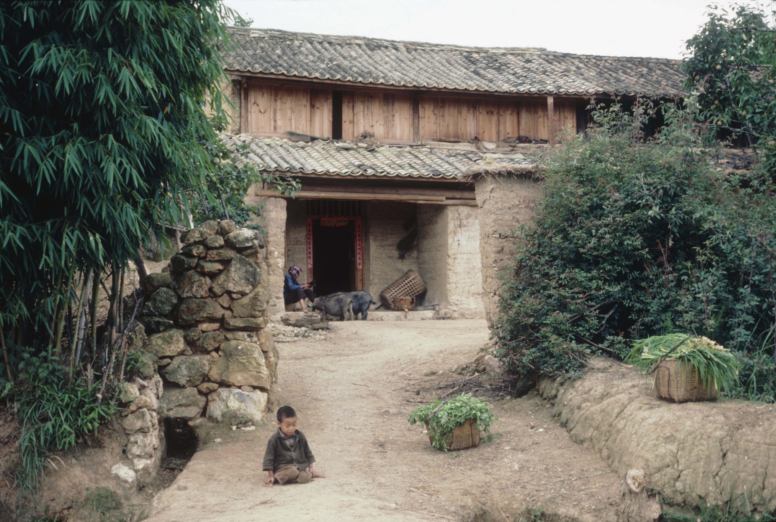 Farmhouse near Burma Road between Lufeng and Kunmingm Yunnan at about mile 45 (kilometer 71.5).