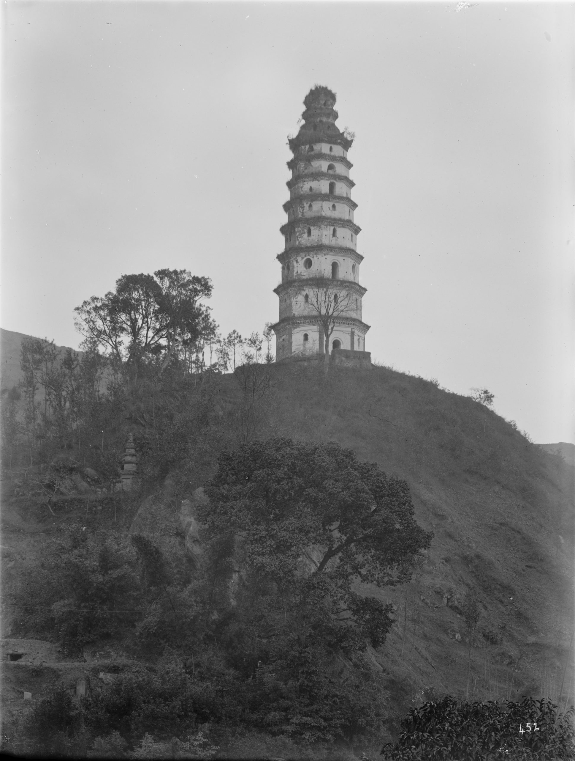 A pagoda in Yibin (Sui fu), Sichuan Province in a December 1908 photograph by Ernest Wilson. He notes that they were common features in western China and were supposed to preserve the good-luck of the district in which they were located.