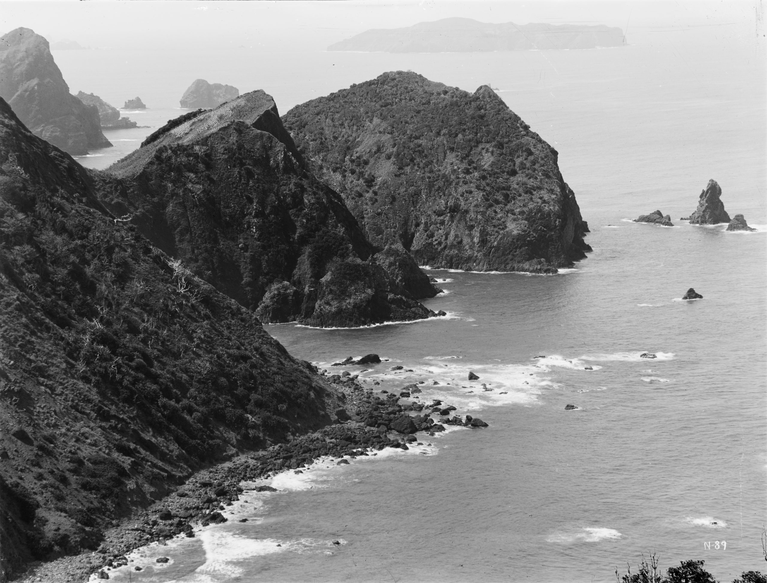 A view from the west coast of Hahajima Island from Naga-hama with Mukojima Island on the horizon. Photograph by Ernest Wilson, April 1917.