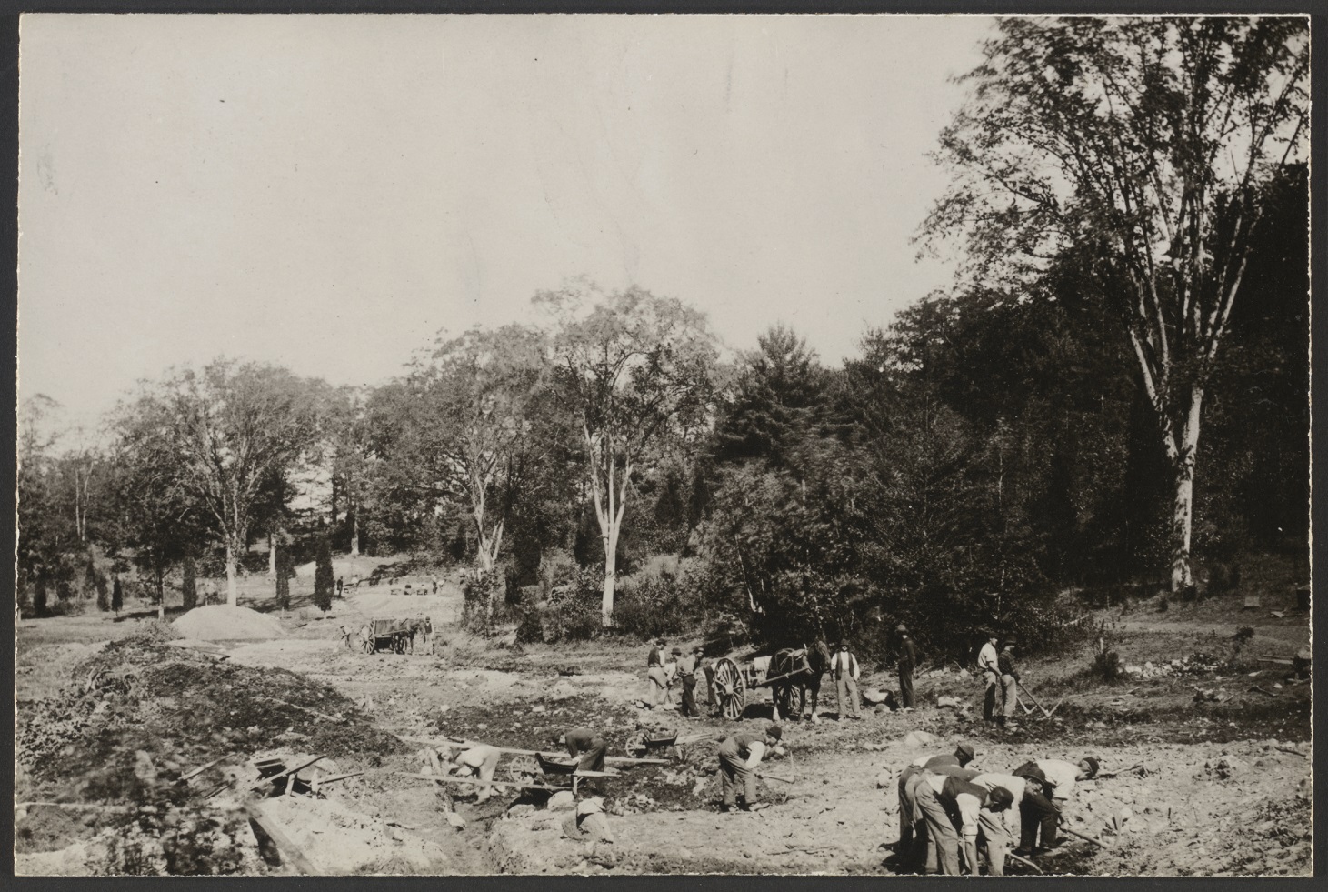 Boston Parks Department laborers constructing Hemlock Hill Road in October 1889.