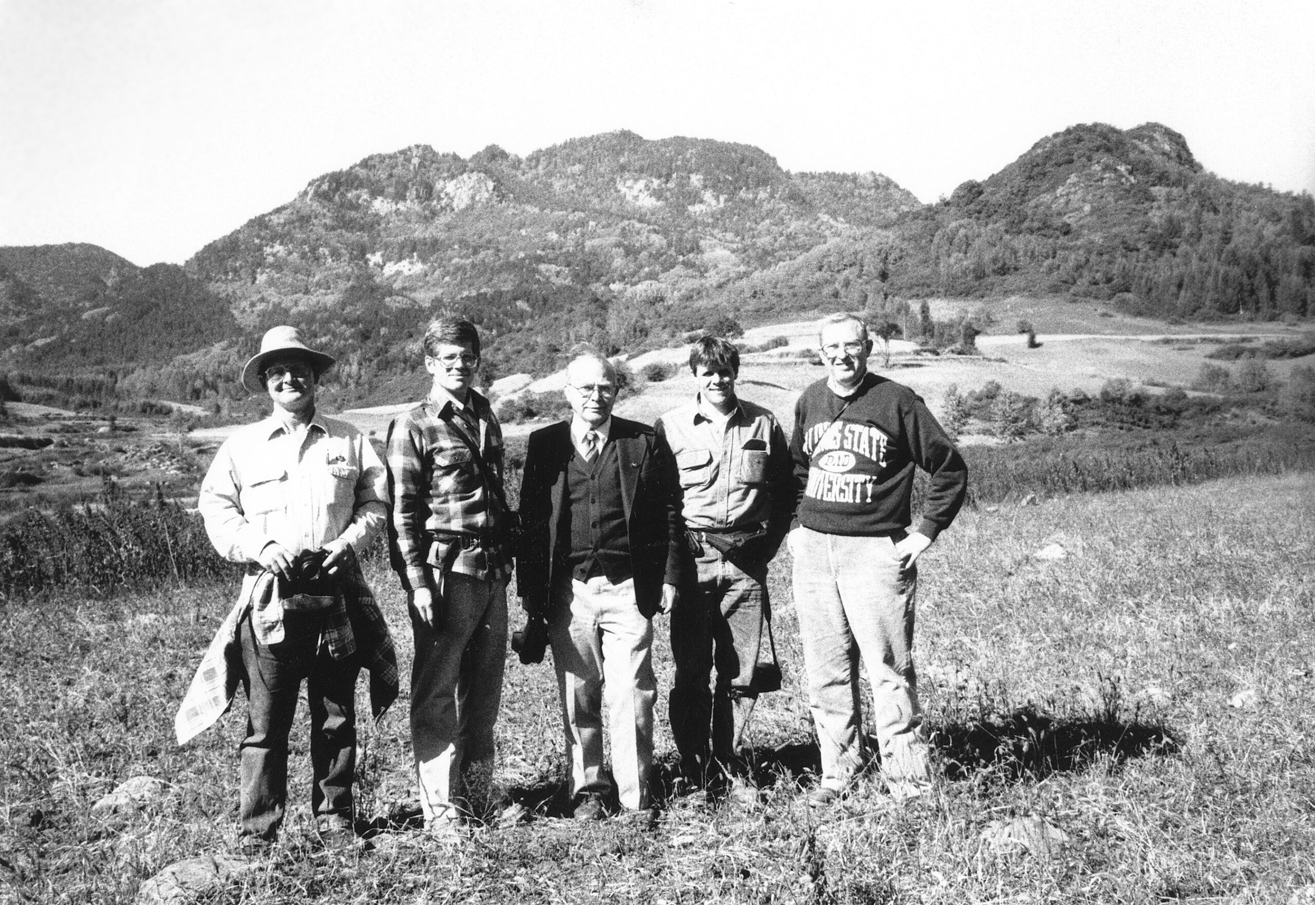 Black-and-white photograph of five plant collectors