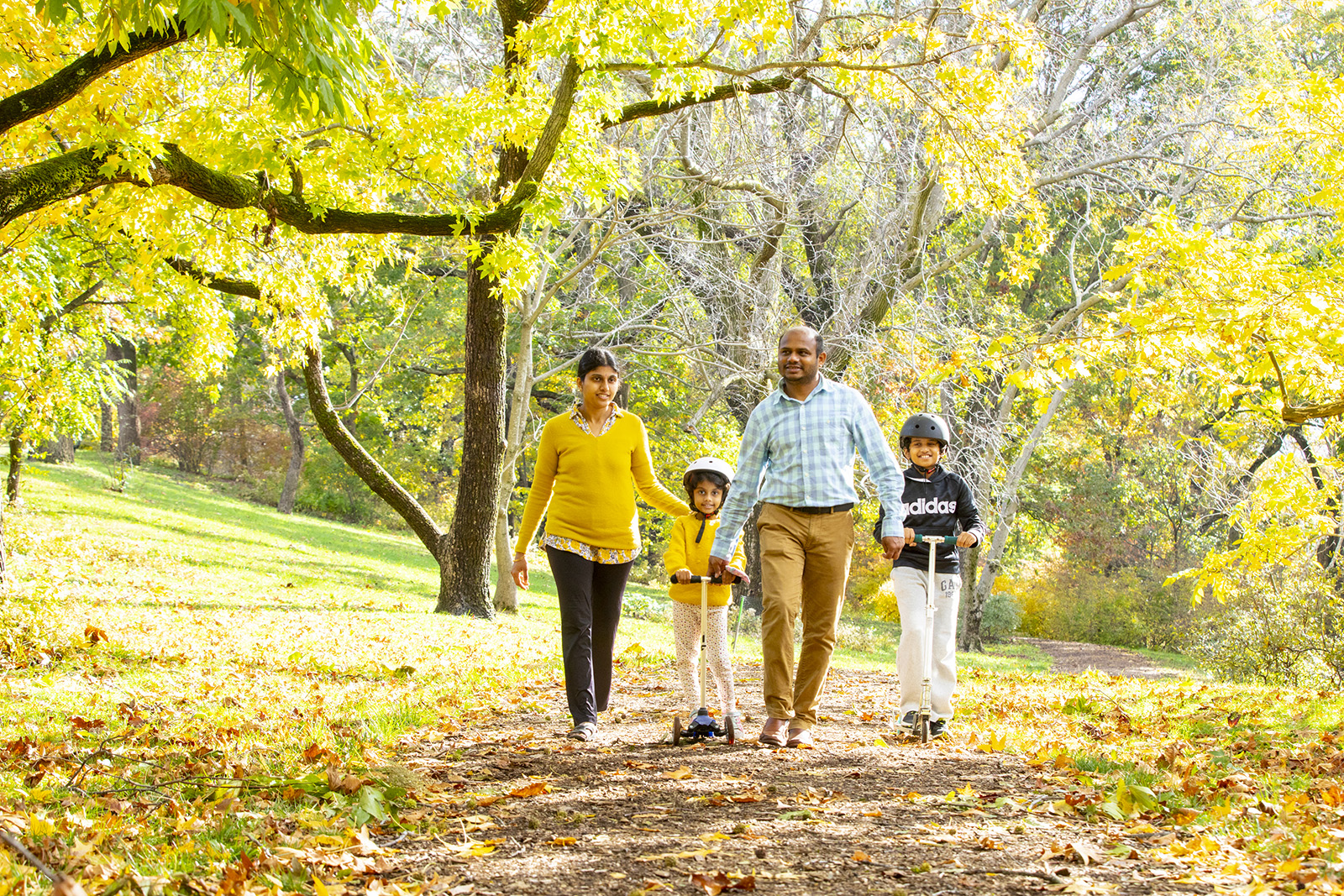 Family visiting oak path