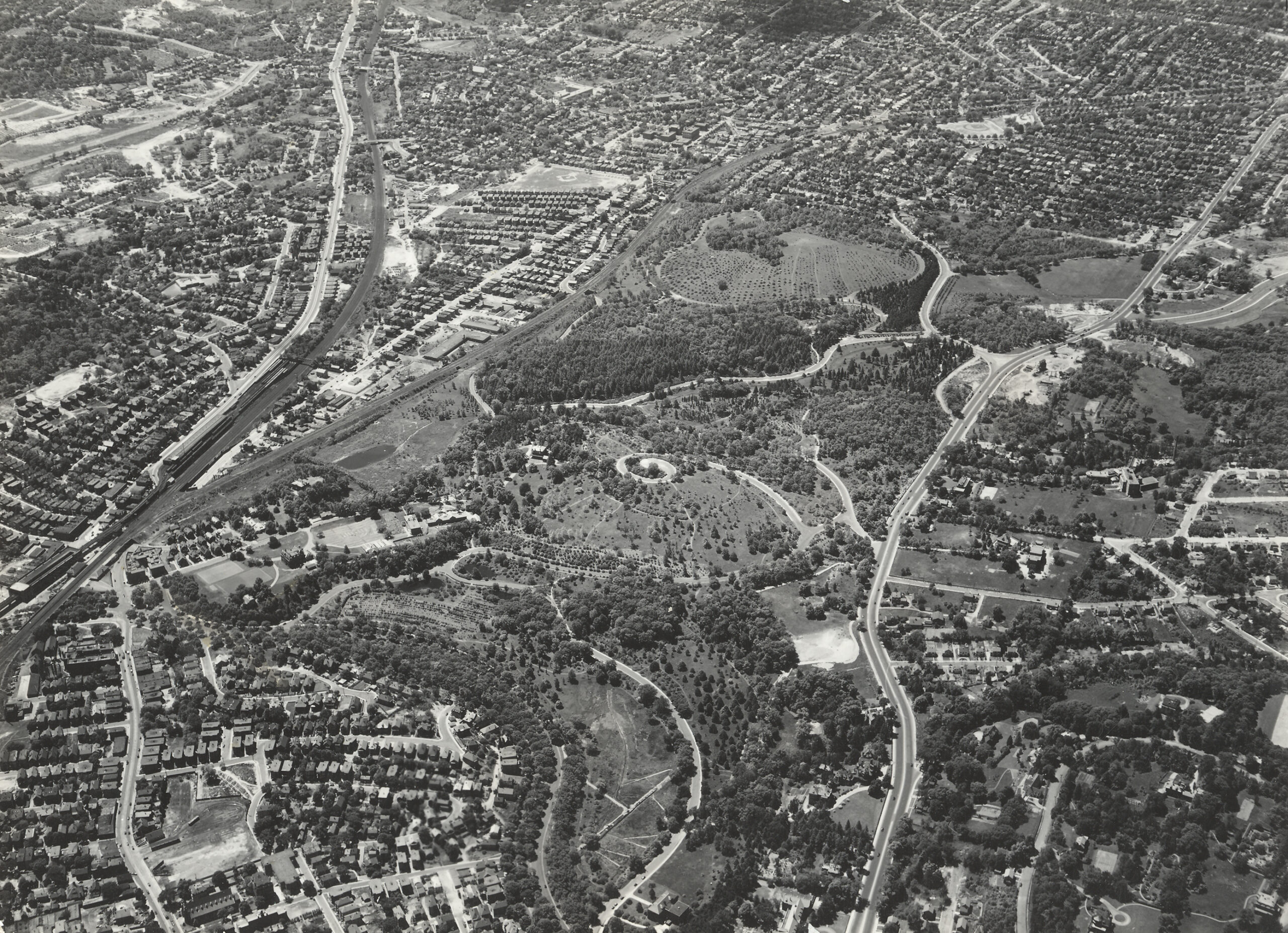 Aerial view of the Arnold Arboretum looking south by Bradford Washburn, 1936.