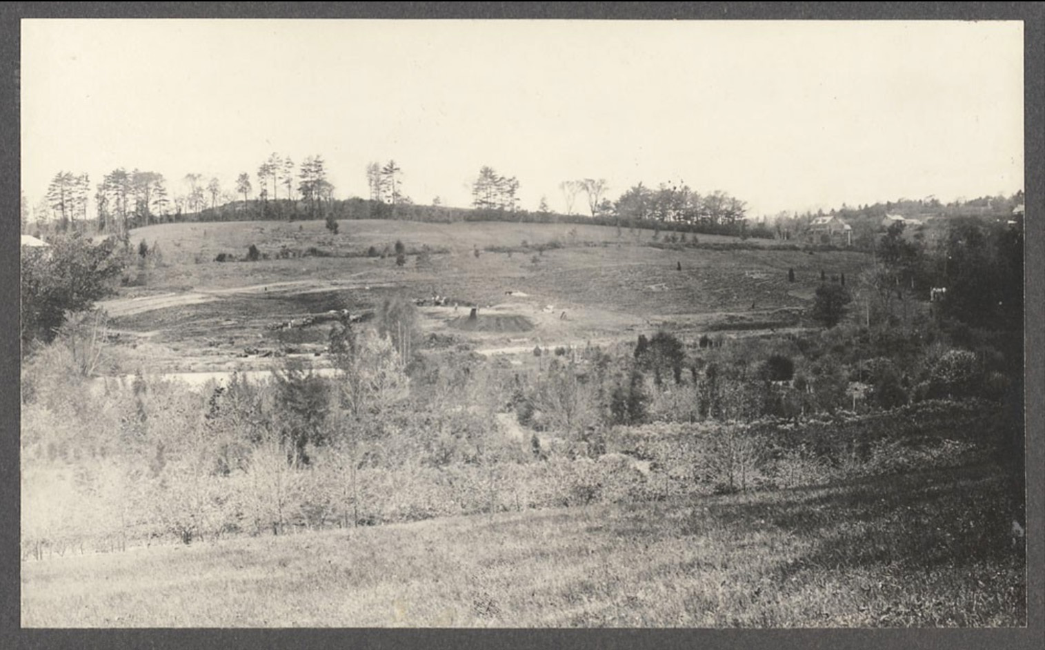 Long view of Bussey Hill Road under construction in fall 1890.