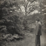 Charles Sprague Sargent standing outdoors at the Arnold Arboretum.