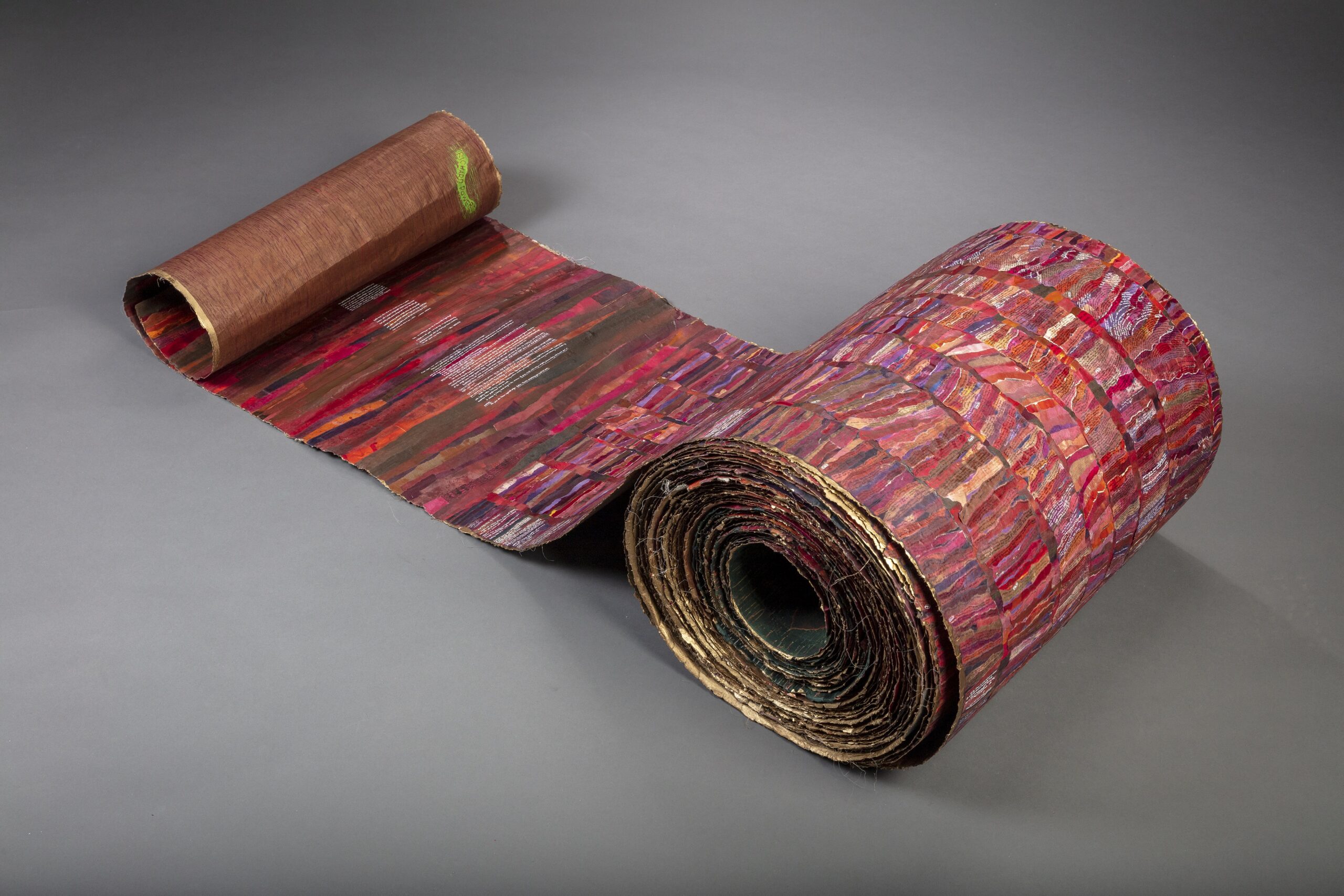 Art, colorful scroll with various materials and time script