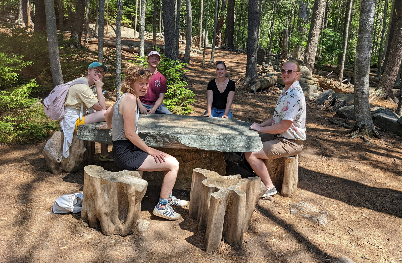 2022 Hunnewell Interns plan their capstone project on site at Weld Hill