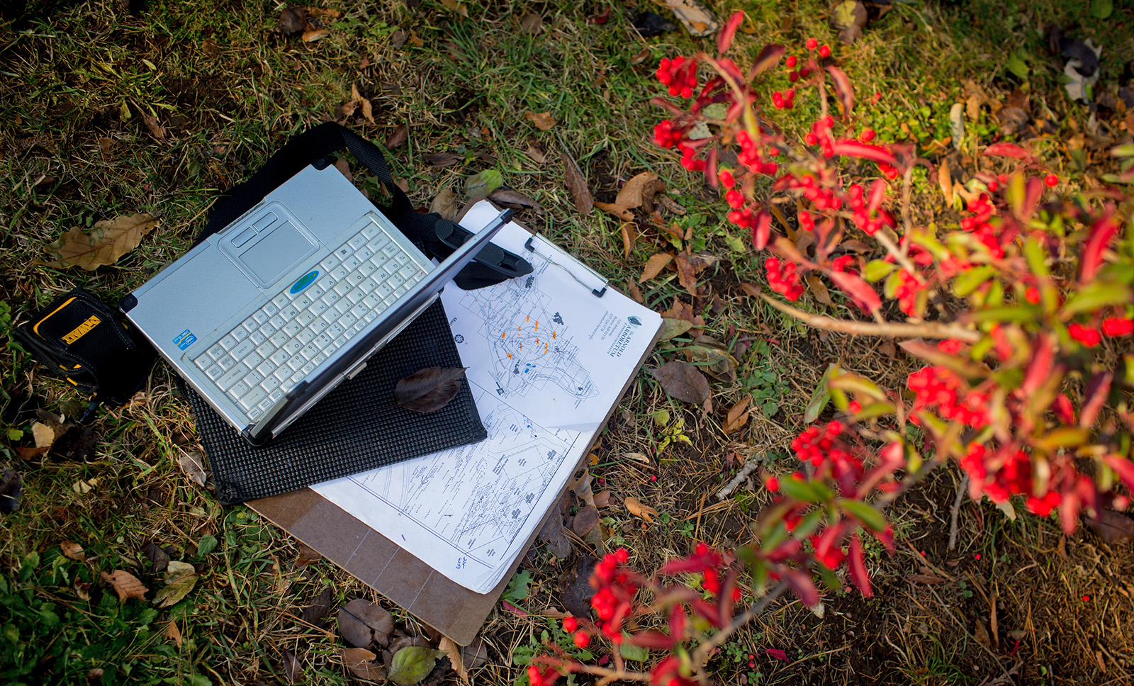 computer and map in the landscape