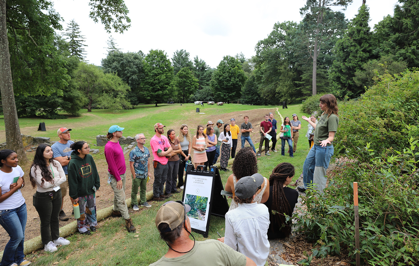Hunnewell interns present their 2024 group project on Bussey Hill to Arboretum staff.