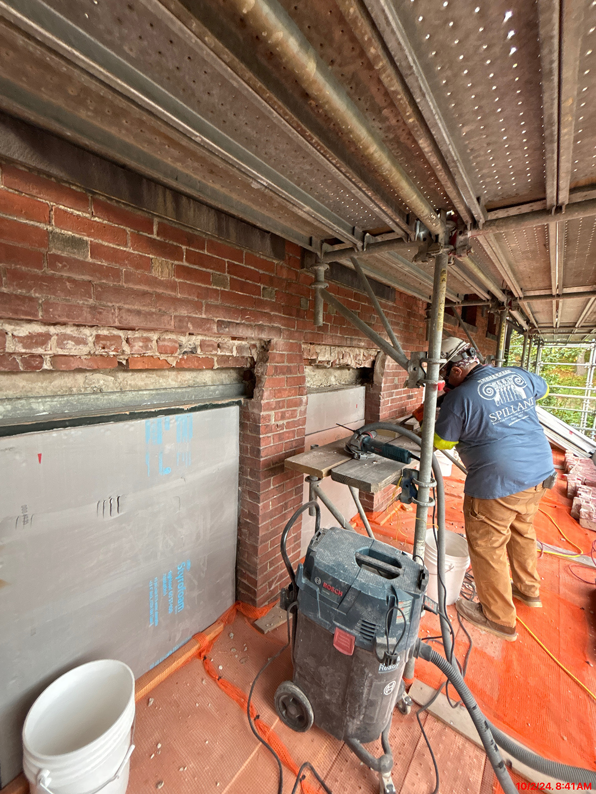 Masonry and window lintel work on the Hunnewell Building