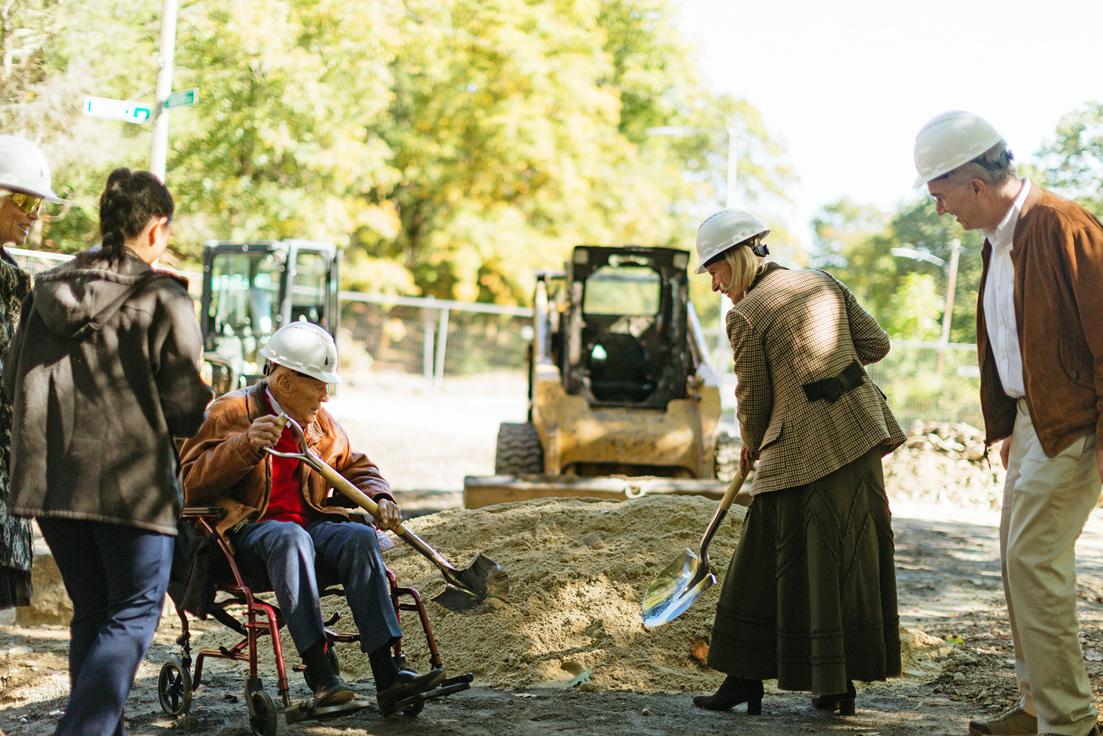 Thomas P. Costin Jr. and RoAnn Costin break ground for the renovation of Poplar Gate at the Arnold Arboretum