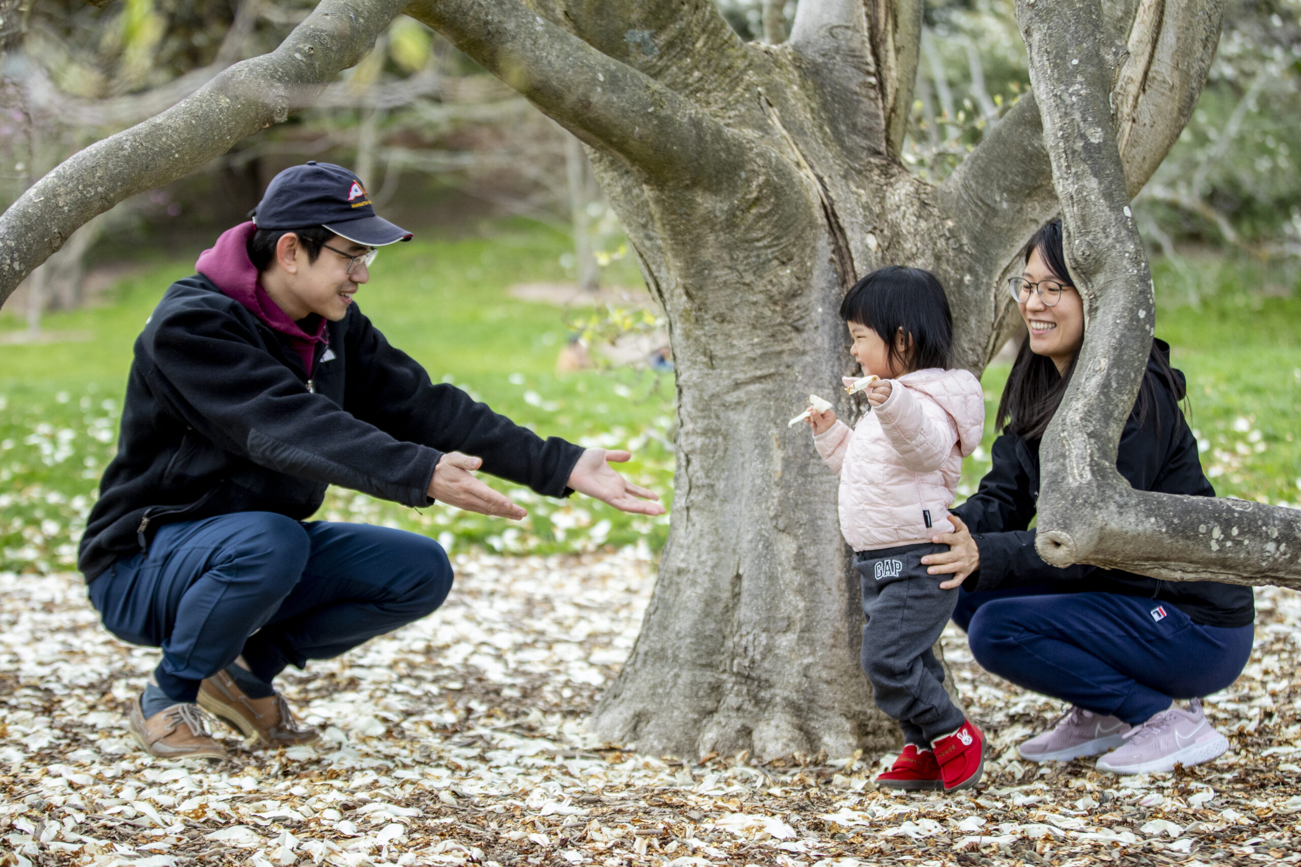child and parents in the magnolia collection